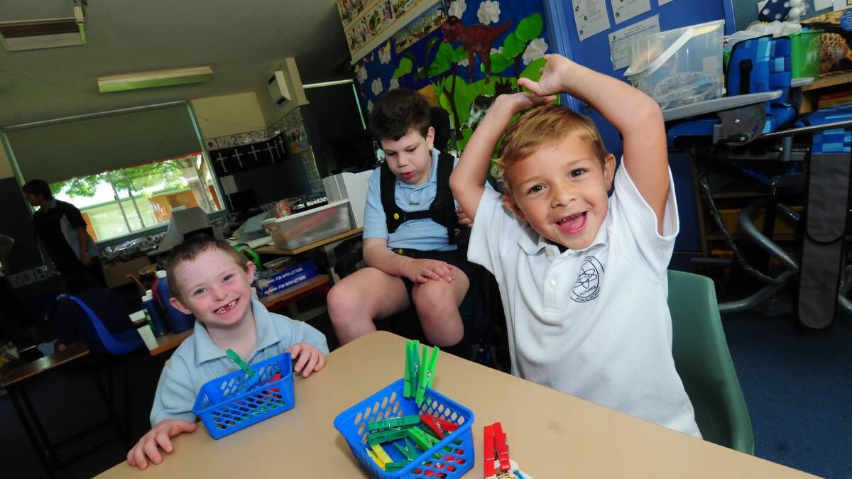 BUNINYONG PUBLIC SCHOOL: Class captain Braithe Jones (middle) shows the new kindergarten studets the ropes during their first week of school. On left is Jayda Kosij and on the right is Cruz Rawiri. 