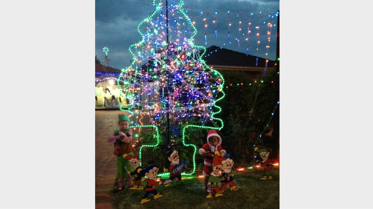 18. HOME: A tree outside made by Tony Bonnington with assistant decorators Mitchell (4) and Mattie (18 months).  Is it the best tree you have seen? Vote below. 
