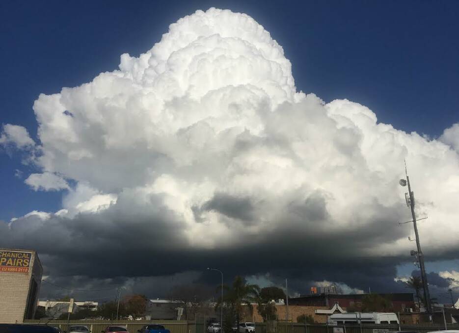 Imposing storm clouds began to appear before the tornado hit on Monday afternoon. Photo: BELINDA SOOLE