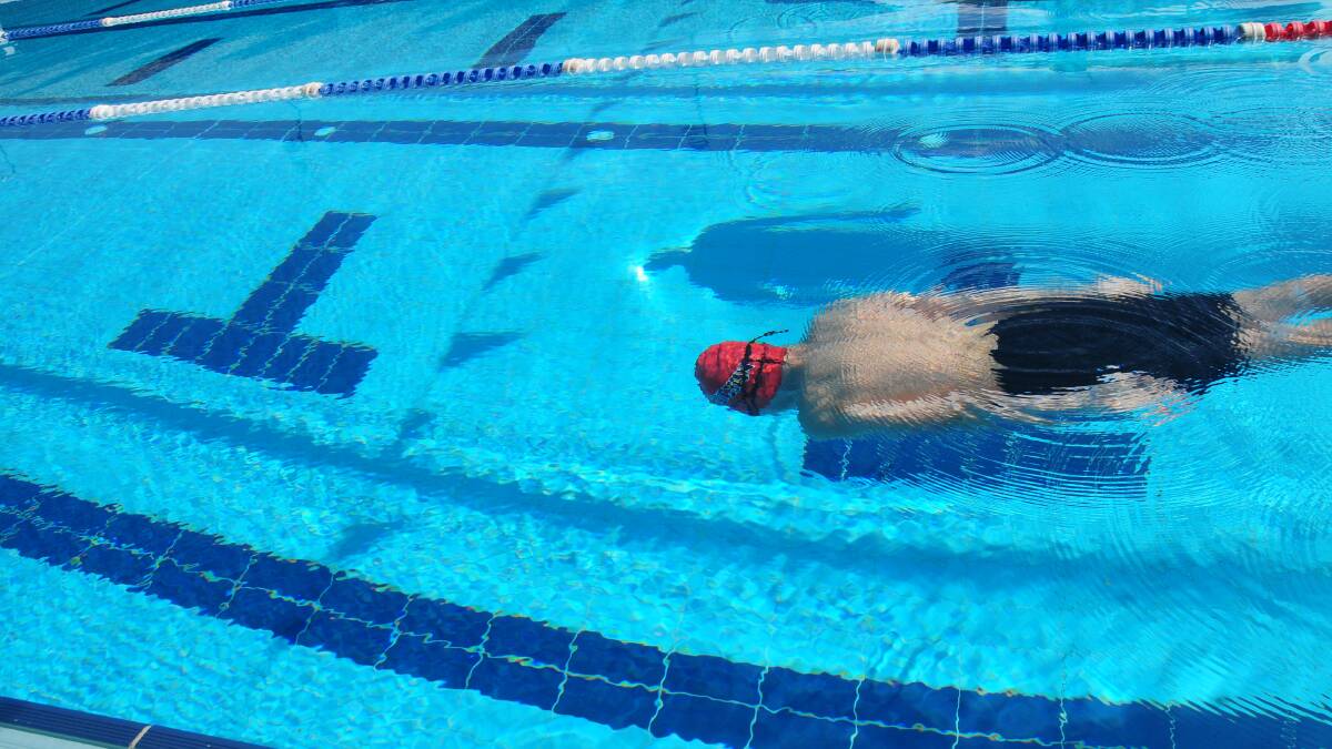 WESTERN REGION SWIMMING CARNIVAL: Hugh Gillham from Cowra in the water.