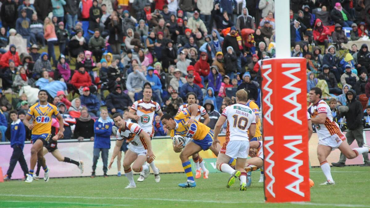 Will Hopoate on his way to scoring the match-levelling try in the dying seconds. Photo: BELINDA SOOLE