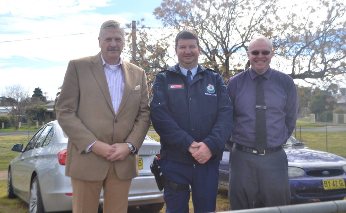 District Court judge Gordon Lerve, Inspector Scott Tanner, and Gareth Smith (Woolworths) are part of the Dob In A Dealer campaign in Wellington.