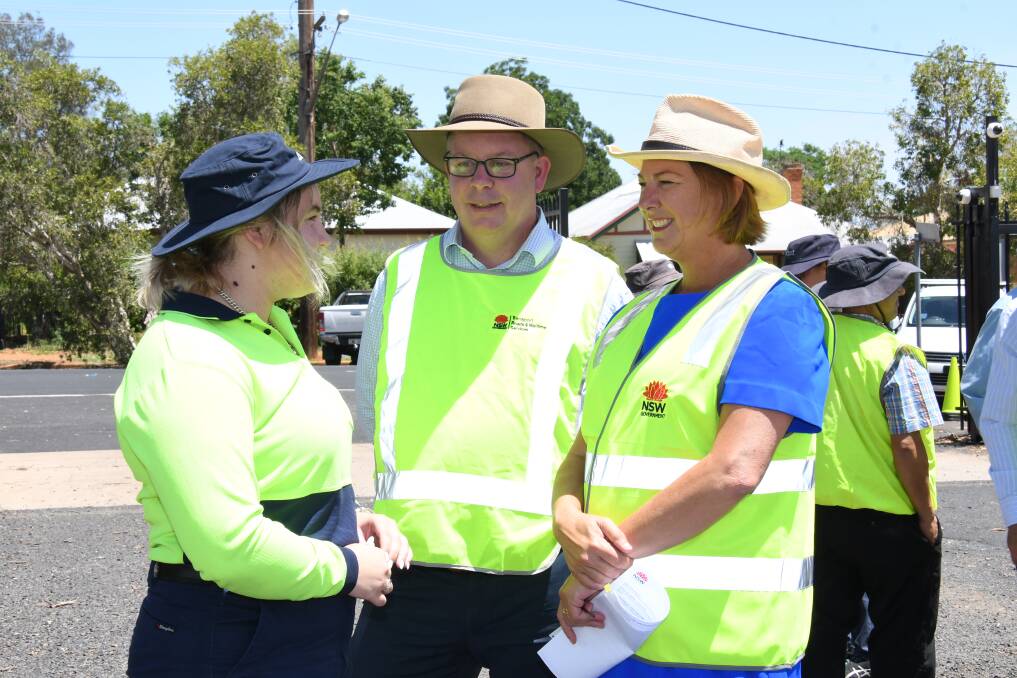 WOMEN REPRESENTED: Kaylee Nelson with Roads and Maritime Services director western region Alistair Lunn and NSW Roads Minister Melinda Pavey are encouraging more women into male-dominated roles. Photo: BELINDA SOOLE