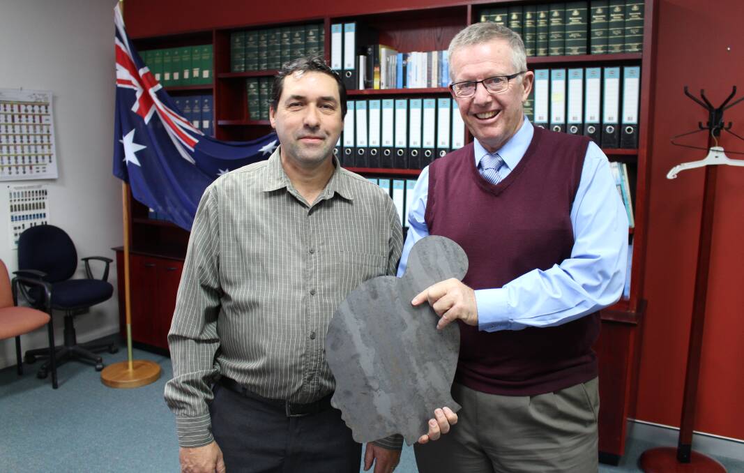 GROWING DEMAND: Ballimore artist Adam King with Federal Member for Parkes Mark Coulton after he was awarded a grant to grow Urban Sculpture Aboriginal Corporation. Photo: CONTRIBUTED