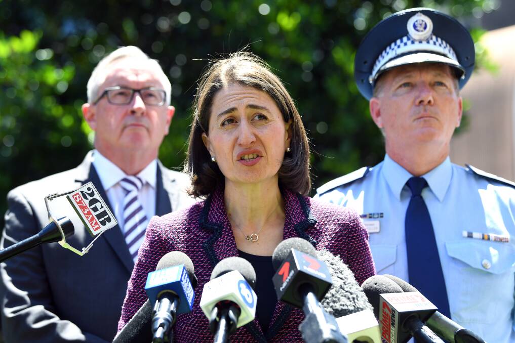 TAKING ACTION: Premier Gladys Berejiklian, NSW Health Minister Brad Hazzard and NSW Police Commissioner Mick Fuller announcing the commission into ice. Photo: AAP IMAGE/JOEL CARRETT