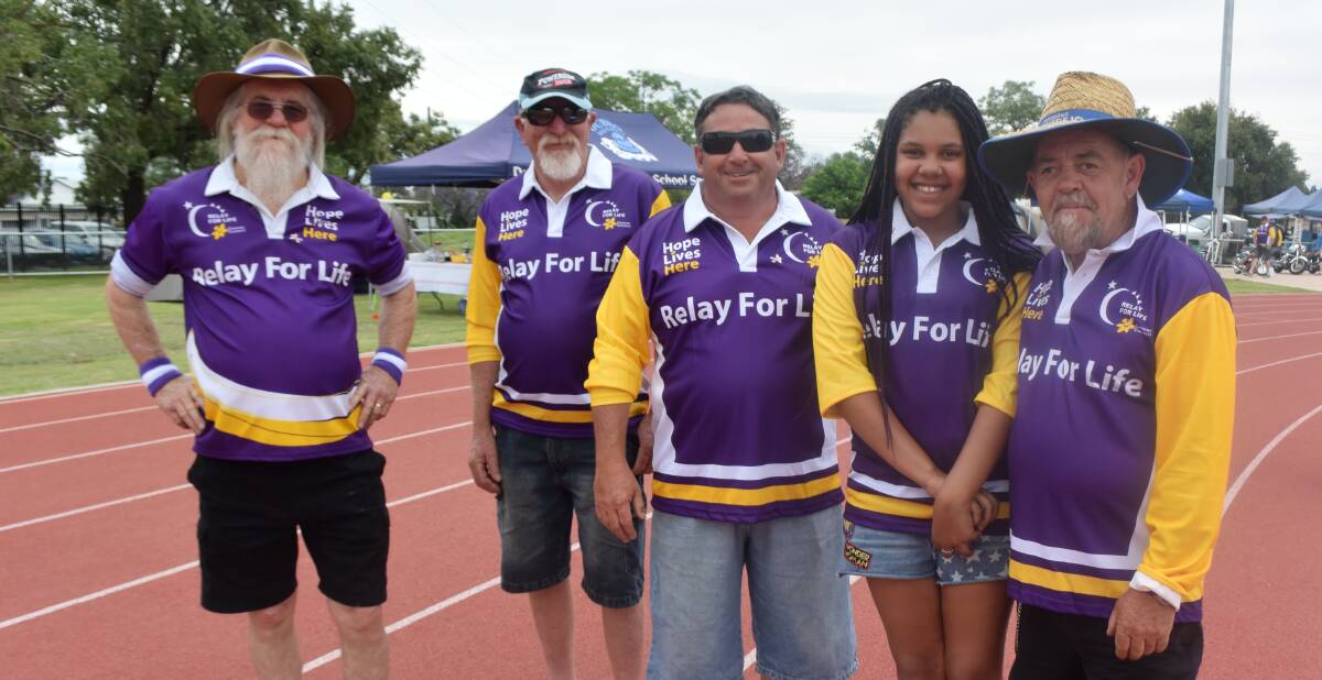 SUPPORT: Carole's Crew, comprised of Larry Berrier, Brian Freeman, Martin Morris, Tyler Dixon and Peter Berrier, walking around the track at the last Orana Relay for Life. Photo: JENNIFER HOAR