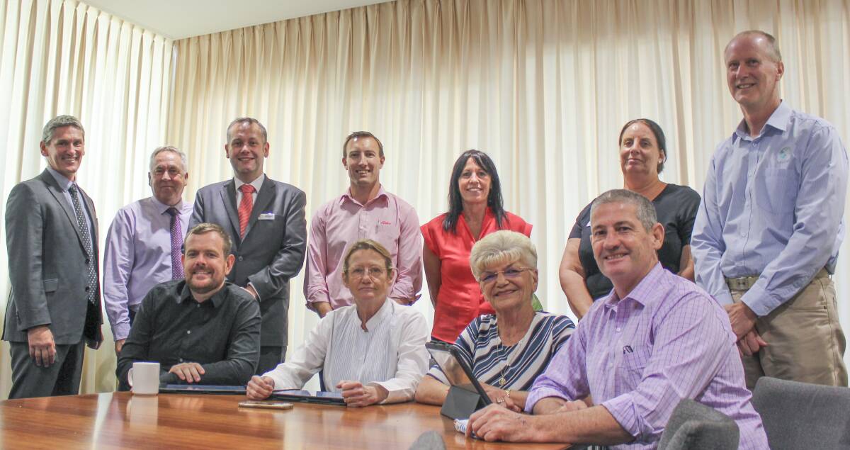 CHANGE: Committee members with Teena Bonham from Family and Community Services, and Maree Keen and Ed Zarrow from Lives Lived Well. Photo: CONTRIBUTED