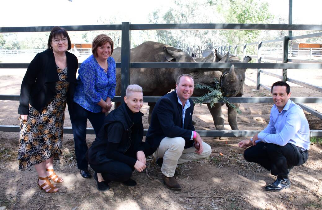 RECOGNITION: Marilyn Brann, Toni Beatty, Kerrieanne Nichols, Ben Luck and Matt Wright launching the 2019 Rhino Awards with two of the zoo's back rhinos. Photo: AMY McINTYRE