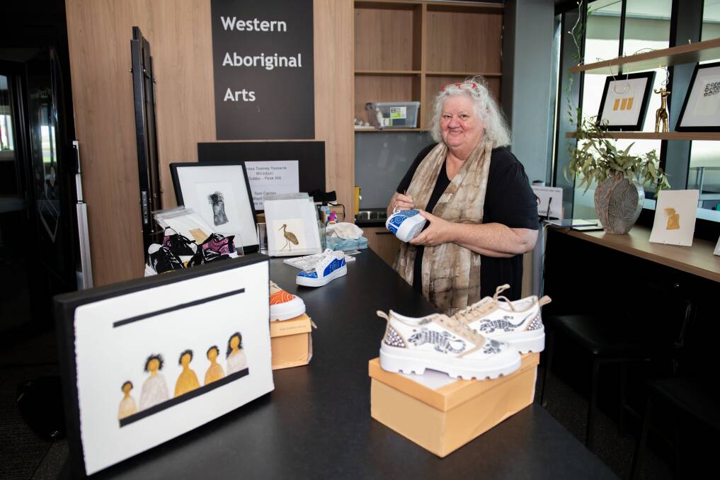 Wiradjuri artist Teresa Yasserie at her pop-up shop at the Dubbo airport. Picture by Belinda Soole