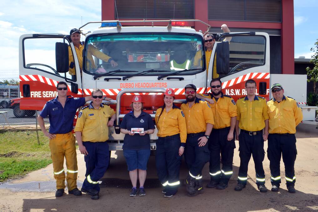 SAFETY: The Dubbo Rural Fire Service crew at last year's Get Ready weekend. It's a chance for families to be prepared for bush fires by speaking with the volunteers. Photo: BELINDA SOOLE