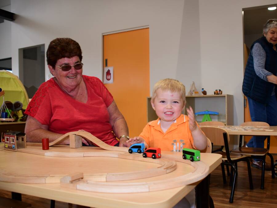 AUSTRALIAN-FIRST: Helen Wykes and Morgan Thomas Wykes checking out the toys at Wellington's Maranatha Gunyah Centre community open day at the weekend. Photo: AMY McINTYRE