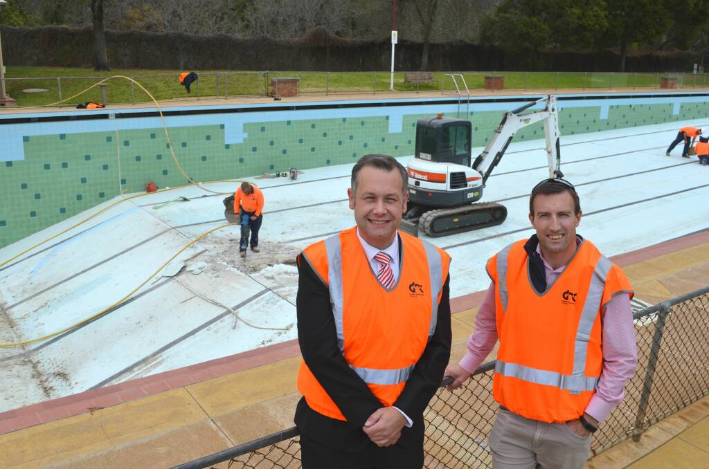 WORK: Dubbo Regional Council mayor Ben Shields and councillor David Grant inspecting a geotechnical investigation at Wellington pool recently. Photo: MARK RAYNER