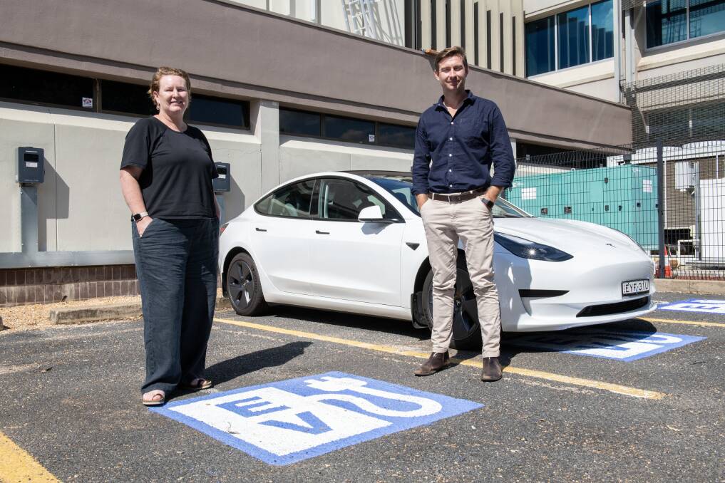 Catriona Jennings and Jamie Lobb at the council's electric vehicle charging station. Picture by Belinda Soole