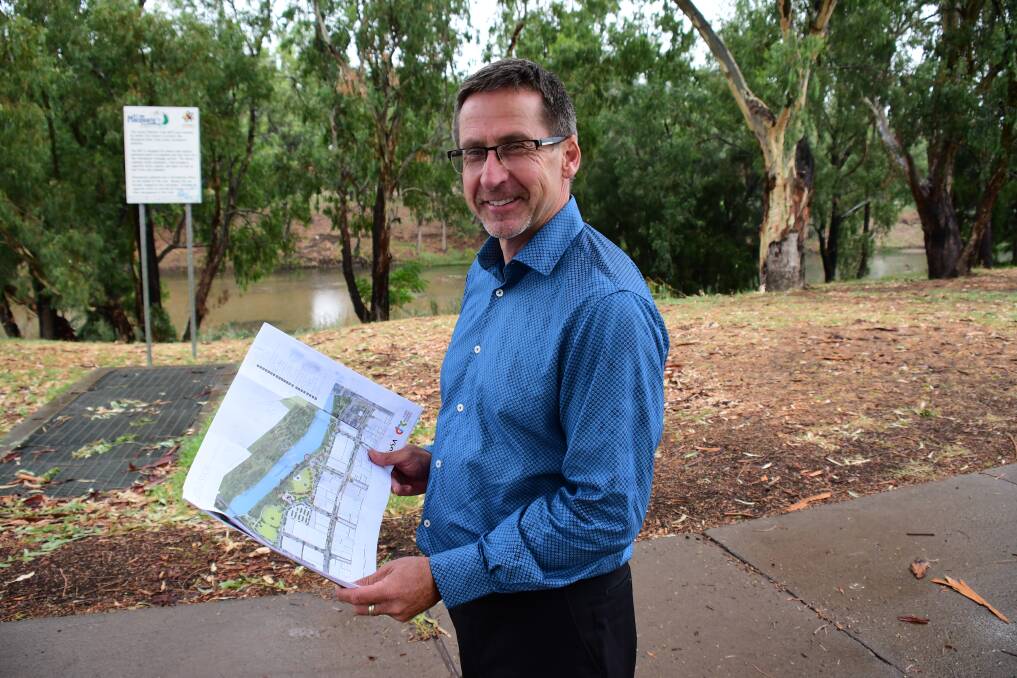 REJUVINATING THE SPACE: Dubbo Regional Council's livability architect Ian McAlister with the two options that were available for the river masterplan. Photo: BELINDA SOOLE 