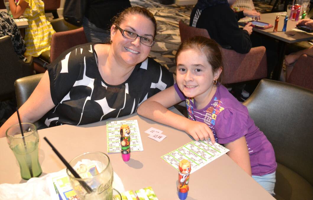 NON-STOP ENTERTAINMENT: Mahalia Maher and Adelaide Maher at Dubbo RSL's kids' bingo last school holidays. It's back again this time to entertain children of all ages. Photo: ORLANDER RUMING