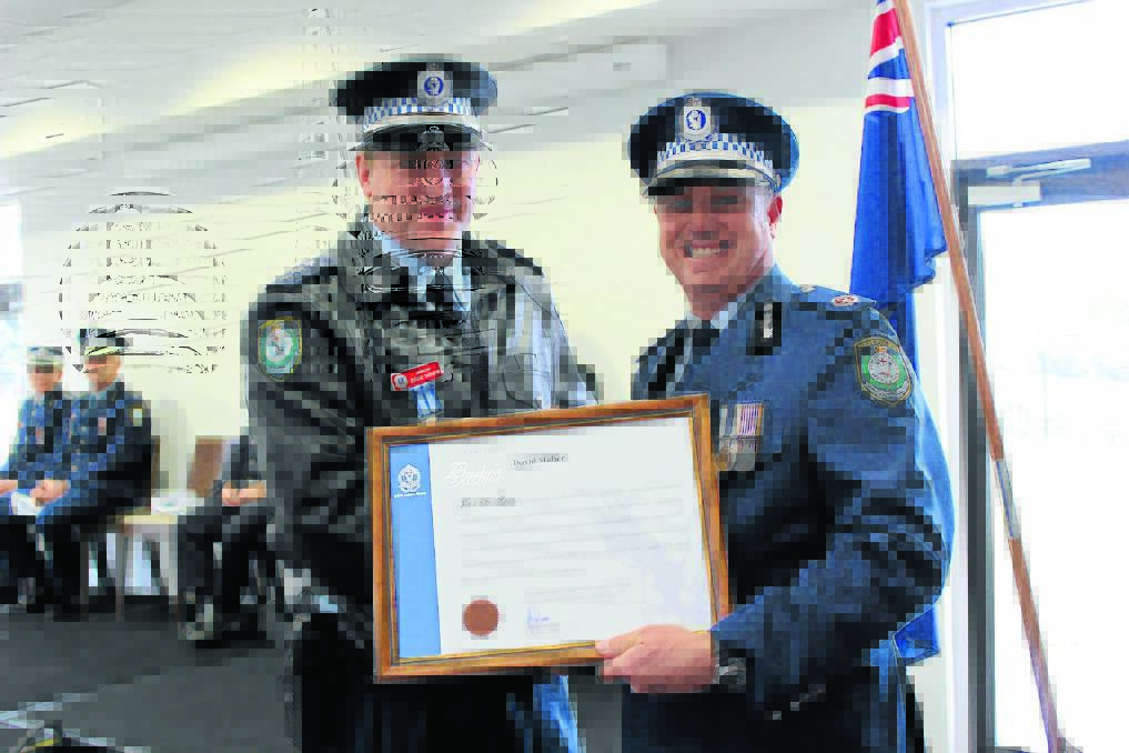 Inspector David Maher when he received a Certificate of Appointment – Commissioned Officer from NSW Assistant Commissioner Geoff McKechnie. Photo: FILE