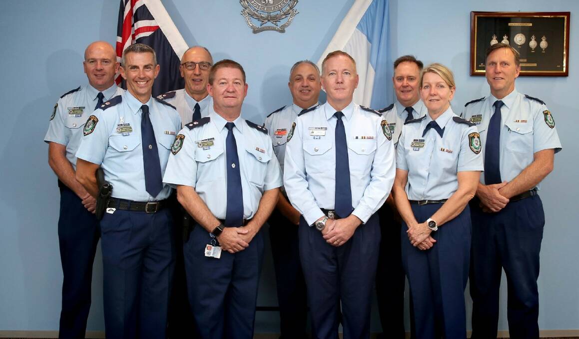 DEDICATION: Dubbo's Peter McKenna (far left) was among eight police officers to be recognised for his committment to the force on Sunday. Photo: NSW POLICE