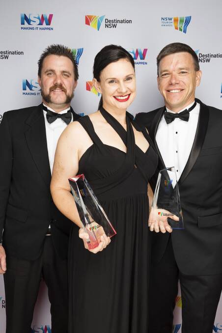 L to R: Zoo staff Hugh Arnold, Penny Costello and Matthew Fuller accepting the gold awards at NSW Tourism Awards.