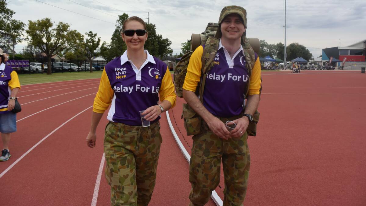 RELAY GETS NEW DATE: Jamie Fox and Dominic Woodhead taking part in a previous Orana Relay for Life at Barden Park to raise money for Cancer Council NSW. Photo: JENNIFER HOAR