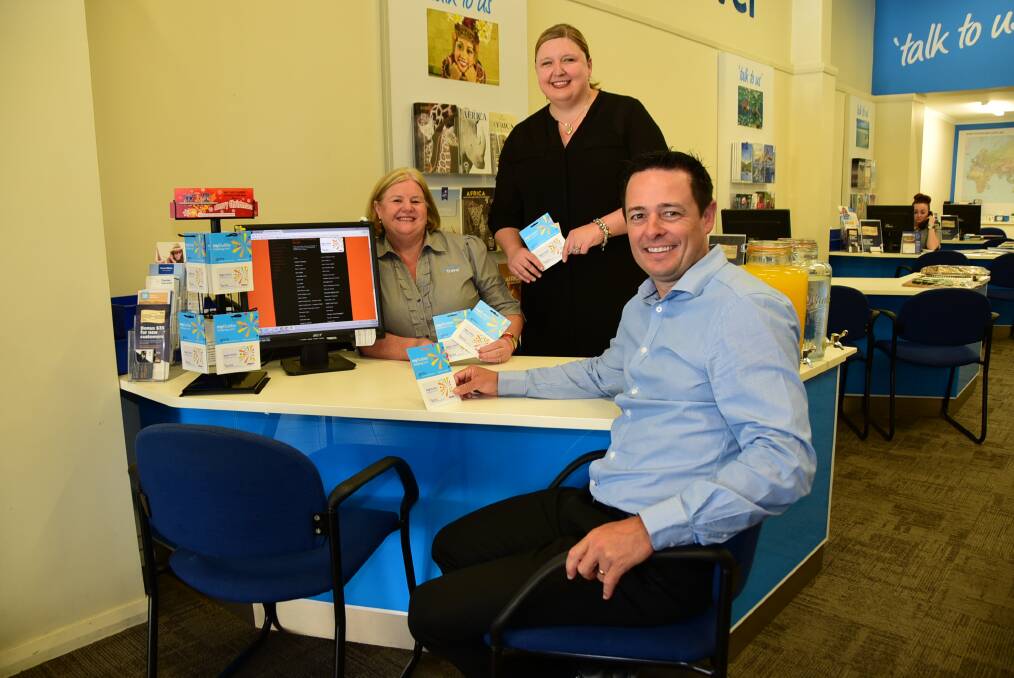 KEEP IT LOCAL: Kerin Stonestreet, Nicola Chandler and Matt Wright with the new myDubbo shopping cards which can be used at 54 Dubbo businesses. Photo: PAIGE WILLIAMS