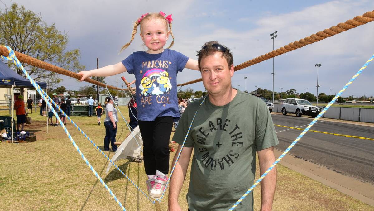 CELEBRATING FAMILY: Summer Walker and her dad Alan Walker sharing some time together at the Dads 4 Kids Festival. Photo: PAIGE WILLIAMS