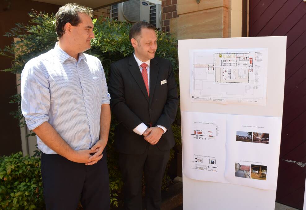 Dubbo Regional Council’s manager visitor experience Jamie Angus and mayor Ben Shields with the proposed plans for the Gaol, which will be on exhibition from Thursday. Photo: ORLANDER RUMING
