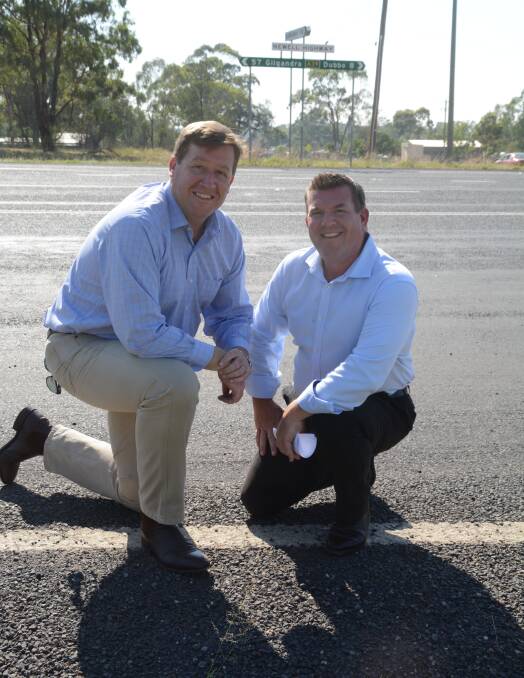 SAFETY FIRST: Dubbo MP Troy Grant and Nationals candidate Dugald Saunders on the Newell Highway where some of the work will be undertaken. Photo: ORLANDER RUMING