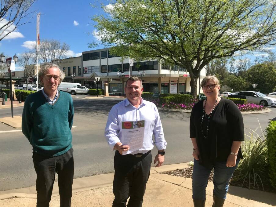 CALL OUT: Festival director and chair Phil Aughey, Dubbo MP Dugald Saunders and board member Liane Morris. Photo: CONTRIBUTED