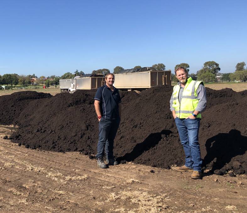 BENEFICIAL: Dubbo Regional Council's acting manager of open space Wes Giddings and JR Richards facilities manager Mark Darwin with some of the compost. Photo: CONTRIBUTED