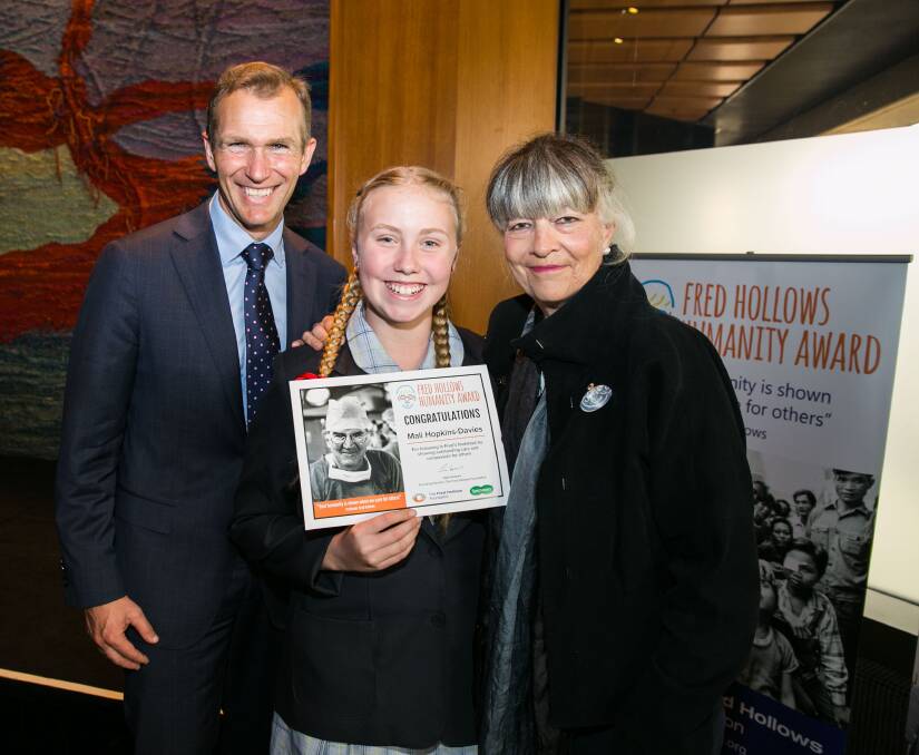 RECOGNITION: NSW Education Minister Rob Stokes with Mali Hopkins-Davies and Founding Director Gabi Hollows. Photo: CONTRIBUTED