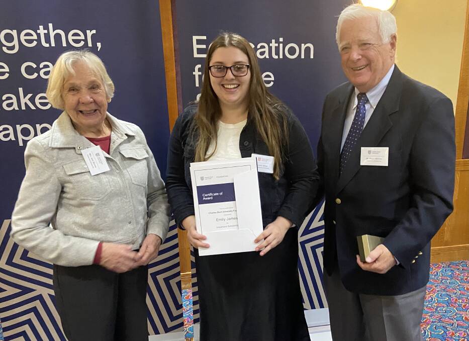 HELPING HAND: Emily James, pictured with Jean and Roger Marrow, has been awarded two scholarships. Photo: CONTRIBUTED