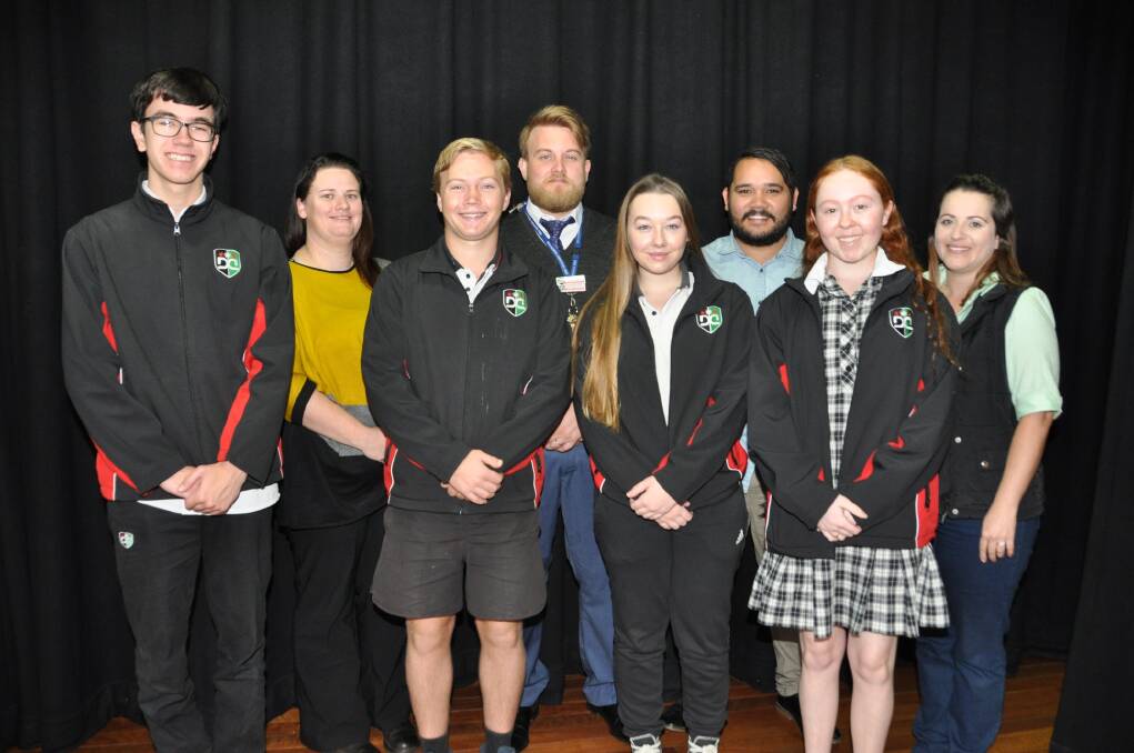 Former students Ronnie Campbell, Ben Palmer, Lionel Wood and Erin Keen with current Year 12 students Tom Roberts, Peter Harrison, Matthia Foran and Maddison Dandridge.