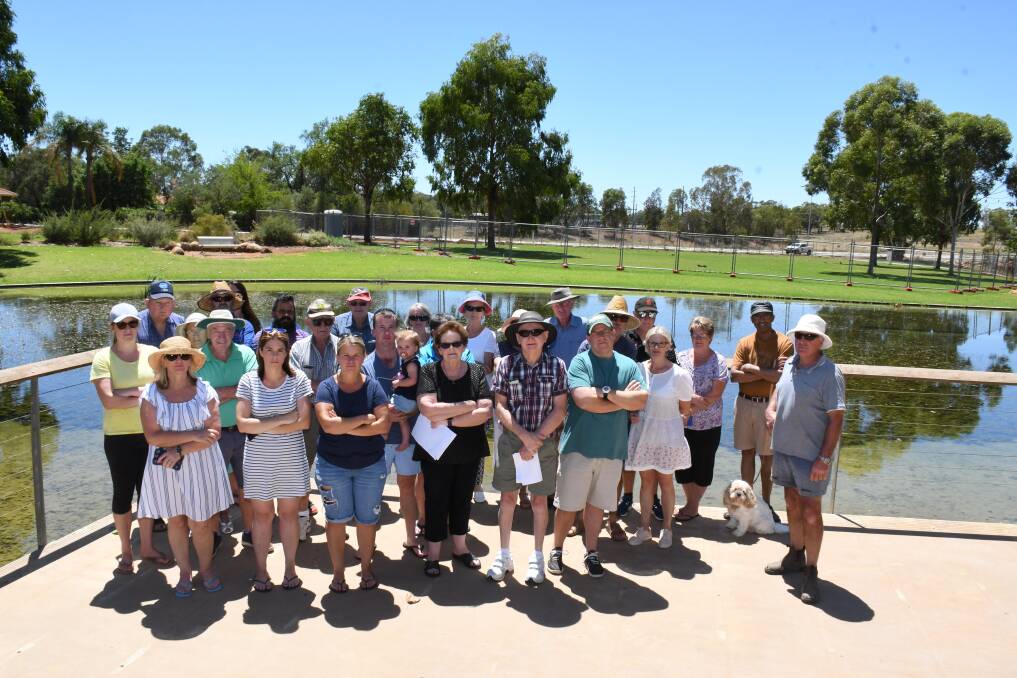 PAVING PARADISE: Southlakes residents are not happy with the planned development of eight units in the park. They want the green space to stay. Photo: AMY McINTYRE