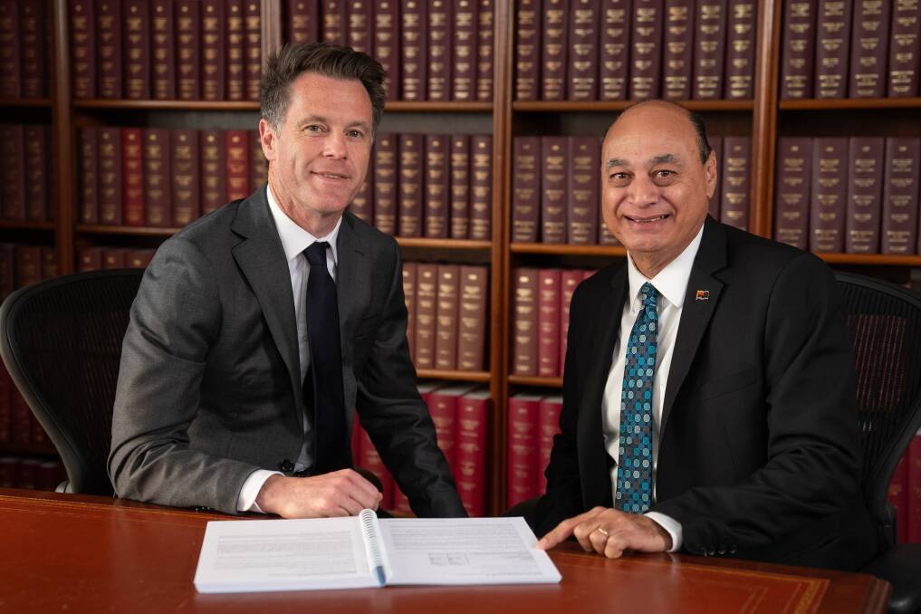 Premier Chris Minns with committee chair Edmond Atalla. File picture