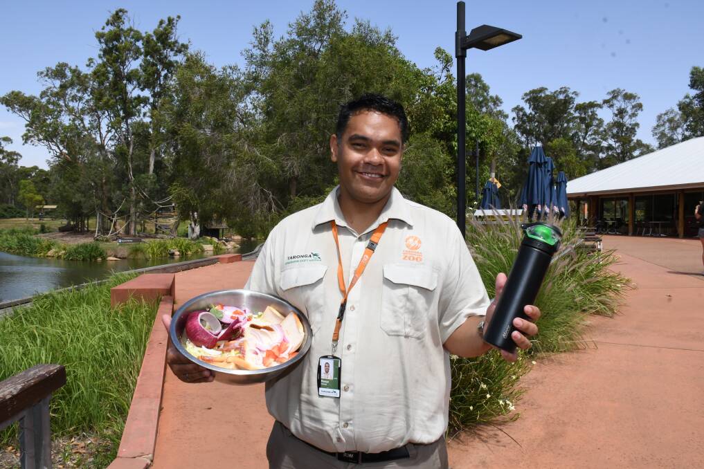MAKE A DIFFERENCE: Taronga Western Plains Zoo’s facilities coordinator Reece Haenga is encouraging the community to cut back on food waste in the new year. Photo: BELINDA SOOLE