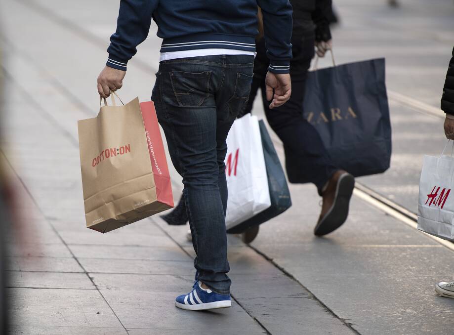 CONSUMER CONFIDENCE: Shoppers are encouraged to keep their money local instead of going to big chains or online. Photo: AAP/ELLEN SMITH