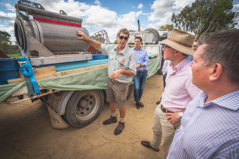 BENEFIT: Taronga Western Plains Zoo leading hand plumber Steven Thomson explaining how the pumps will work. Picture: CONTRIBUTED