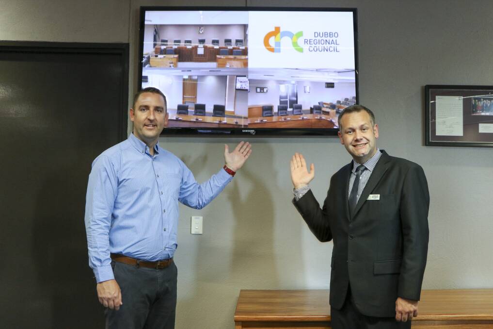 NEW ERA: Dubbo Regional councillor Dayne Gumley and mayor Ben Shields with the live stream facilities in the Dubbo council chamber, which will be first used on Monday. Photo: CONTRIBUTED