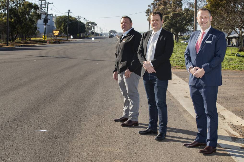 COMPLETED: Councillors Greg Mohr, Stephen Lawrence and Ben Shields inspecting the finished road. Photo: CONTRIBUTED