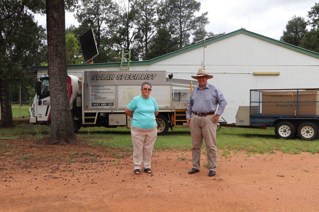 SOLAR: Camp Cypress treasurer/secretary Janet Fitzgerald with Parkes MP Mark Coulton. The grant will be used to install a 12.5KW grid connect solar system to the roof of the dining room. Picture: CONTRIBUTED