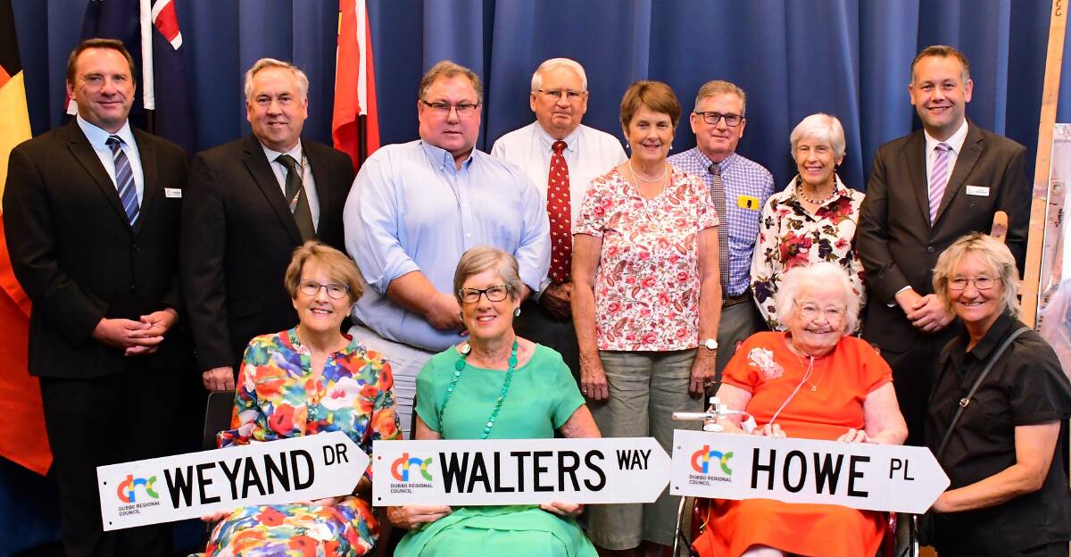 CELEBRATION: The Weyand, Walters and Howe families were given their own street signs in an official ceremony on Thursday. Photo: BELINDA SOOLE