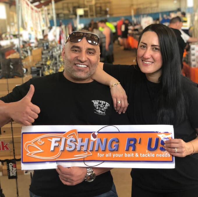 BRINGING SOME LAUGHS: Yahya Tuameh and his wife Daniela in Dubbo, where they are holding a massive fishing sale for three days. Photo: CONTRIBUTED