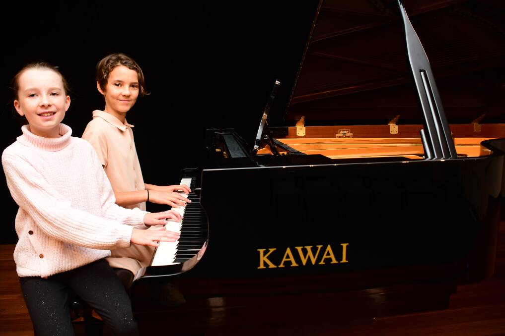 CONGRATULATIONS: Dubbo pianists Larissa Elder and Latai Day were both awarded first place in their sections in the eisteddfod on Sunday. Photo: BELINDA SOOLE
