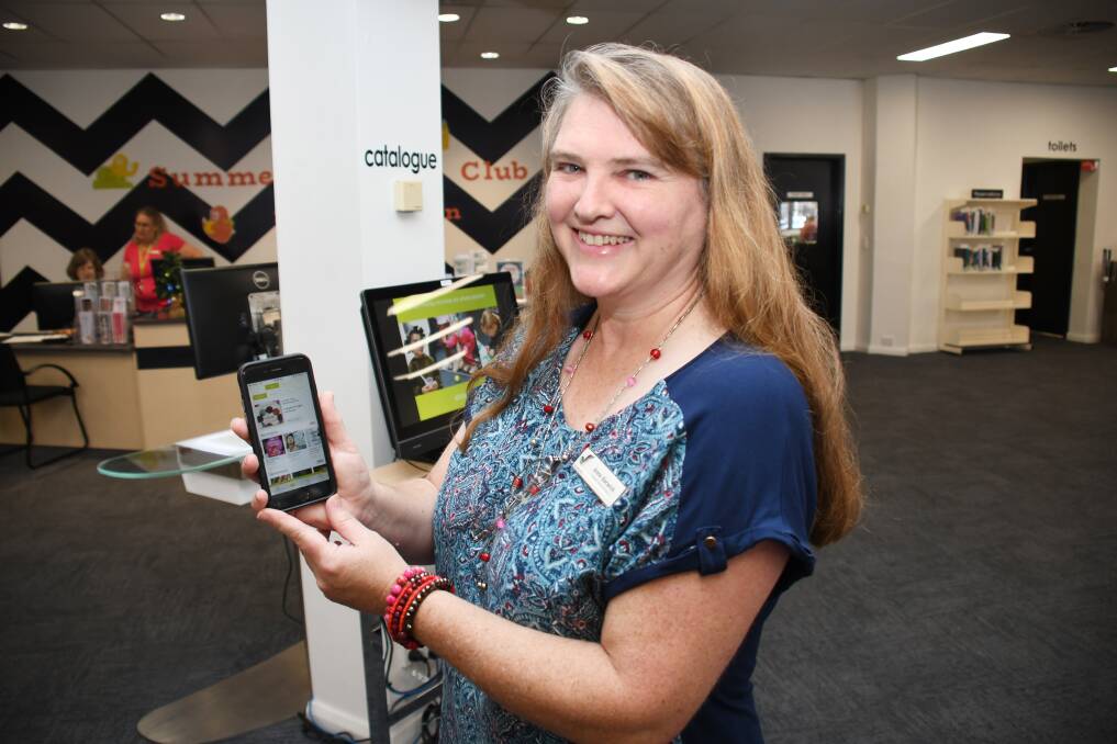 TECHNOLOGY: Acting libraries coordinator Anne Barwick said the staff were on hand to help anyone access the eresources. Photo: BELINDA SOOLE