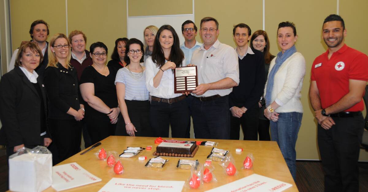 INAUGURAL CHAMPIONS: NAB Dubbo has been presented with a plaque from the Australian Red Cross Blood Service for beating Orange. Photo: ORLANDER RUMING