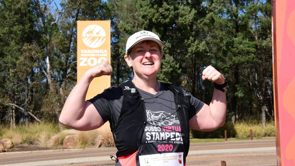 ACHIEVEMENT: Sally Turner after finishing her first half marathon in the virtual Dubbo Stampede. Photo: AMY McINTYRE