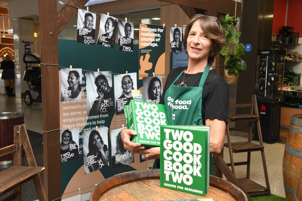 BOOK FOR GOOD: Teena Cochrane with the Two Good Cookbook Two at Dubbo Square, which is available to people who spend $30 in a specialty store or $50 in a major retailer. Picture: AMY McINTYRE