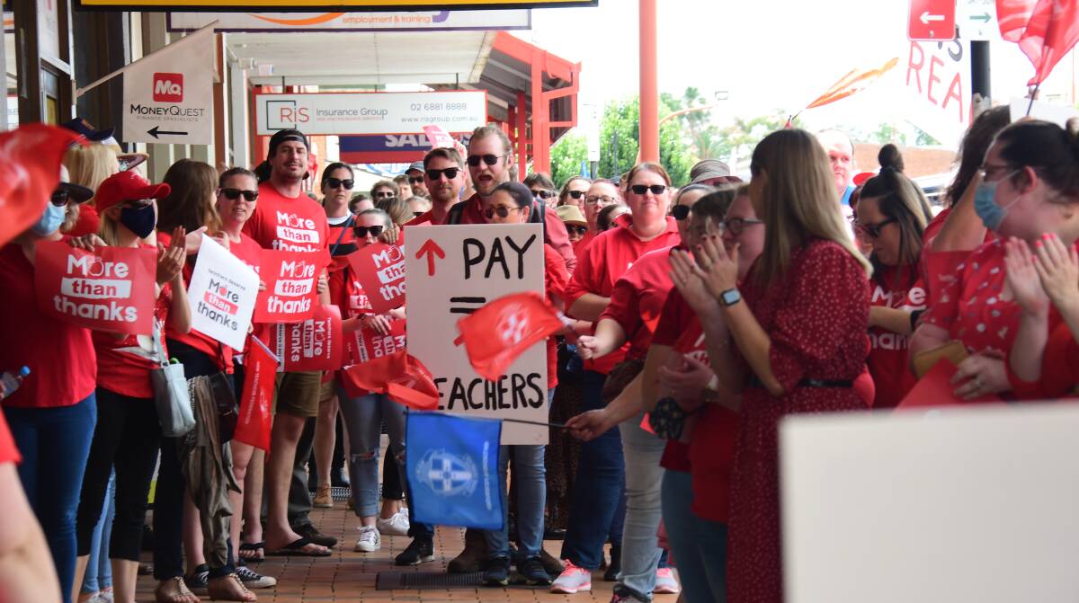 CALL FOR MORE: Hundreds of teachers joined the strike in Dubbo in December, marching through teh central business district. Picture: AMY McINTYRE