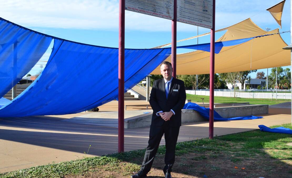 DAMAGE: Dubbo mayor Ben Shields showing the vandalism of the shade sails in April. It was the third time they were damaged. Photo: RYAN YOUNG