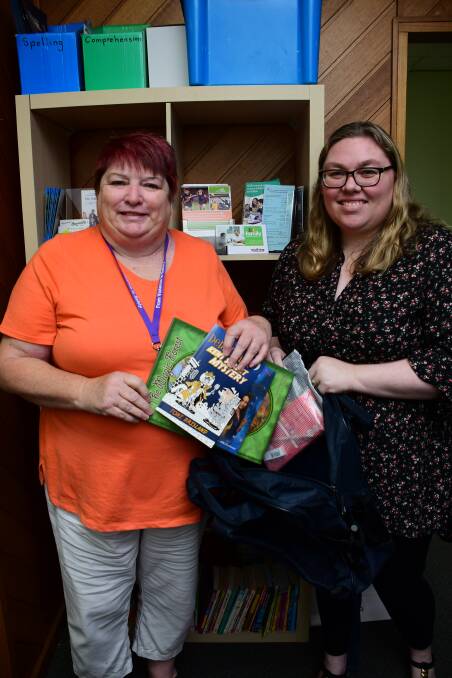 HELPING HAND: The Smith Family Dubbo's Sonia Strachan and Dawn Redding have been busy helping Dubbo students with their back-to-school needs. Photo: BELINDA SOOLE